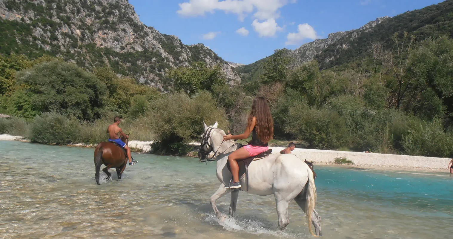 horse riding by Axeron river